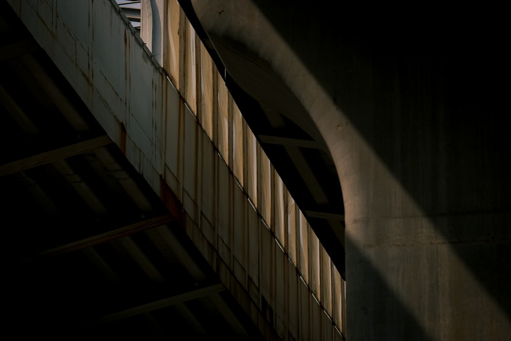 a traffic light on the side of a bridge