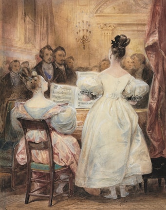 A group of people gathered in an elegant room with classical decor. Two women in period dresses are positioned at the center, one seated at a piano with sheet music in front of her, and the other standing nearby. The audience, composed mainly of men in formal attire, is closely observing them. The room is adorned with a chandelier and intricate architectural details.