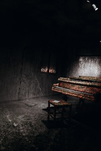 A serene room with pastel pink, purple, and blue tones equipped for one-on-one music therapy.