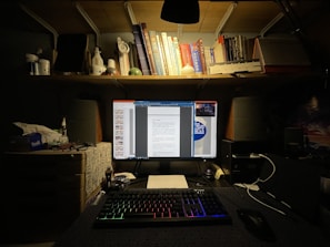 Close-up of a lawyer’s desk featuring legal books, a laptop, and tasteful decor.