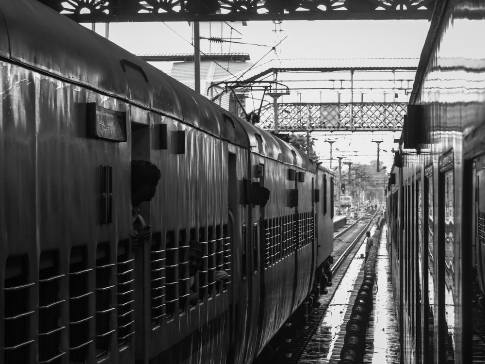 a couple of trains parked next to each other