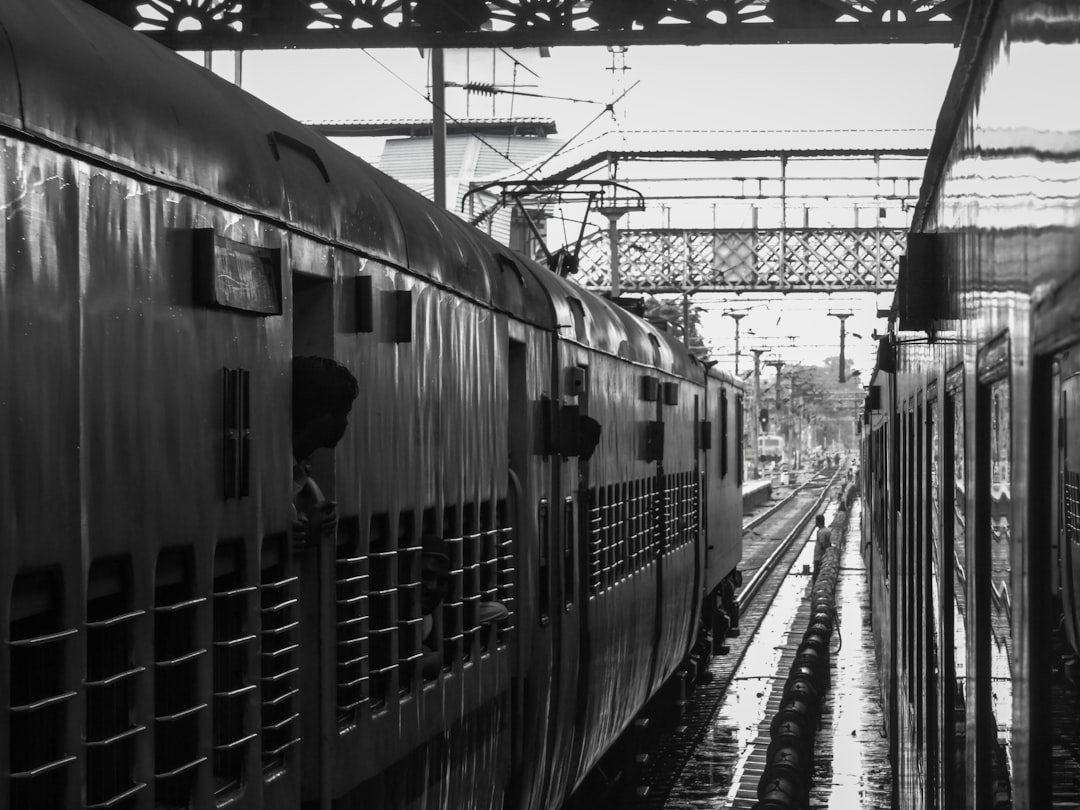 a couple of trains parked next to each other,