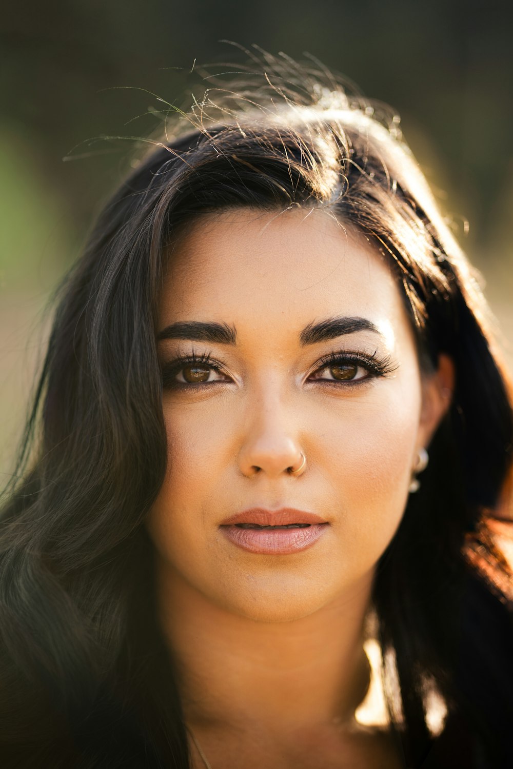 a close up of a woman with long hair