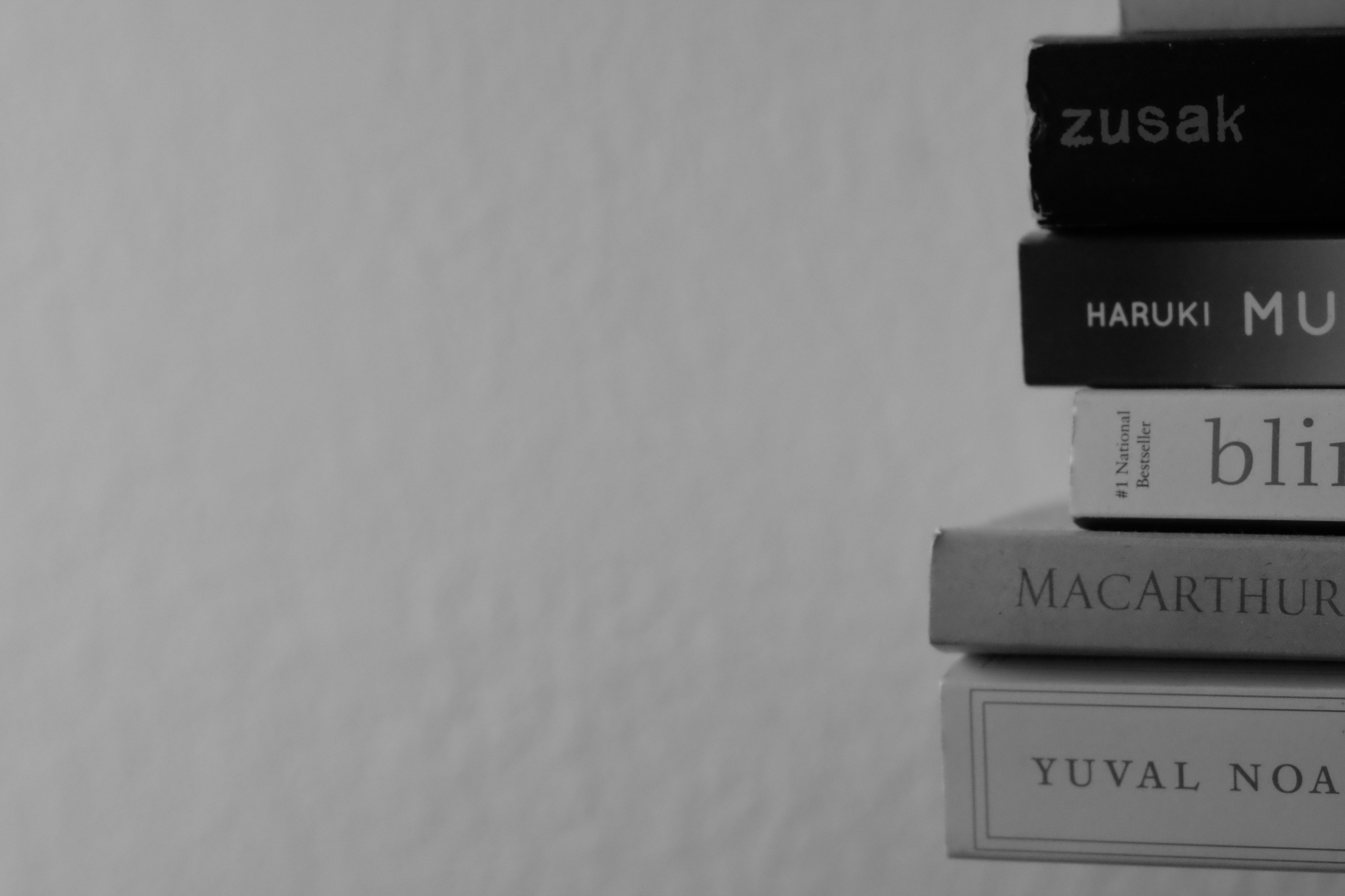 a stack of books sitting on top of each other