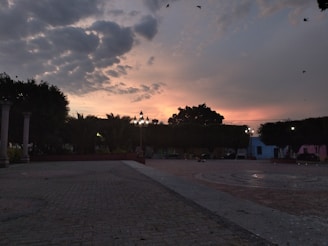 A picturesque view of the town square during sunset.