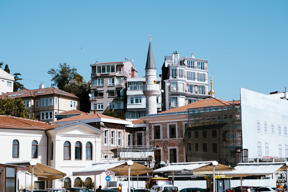 a group of buildings sitting on the side of a road