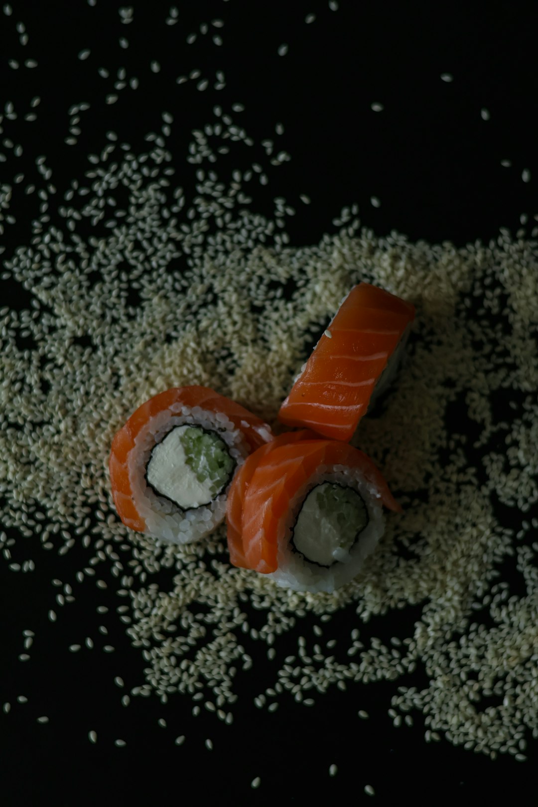 two pieces of sushi on a bed of rice