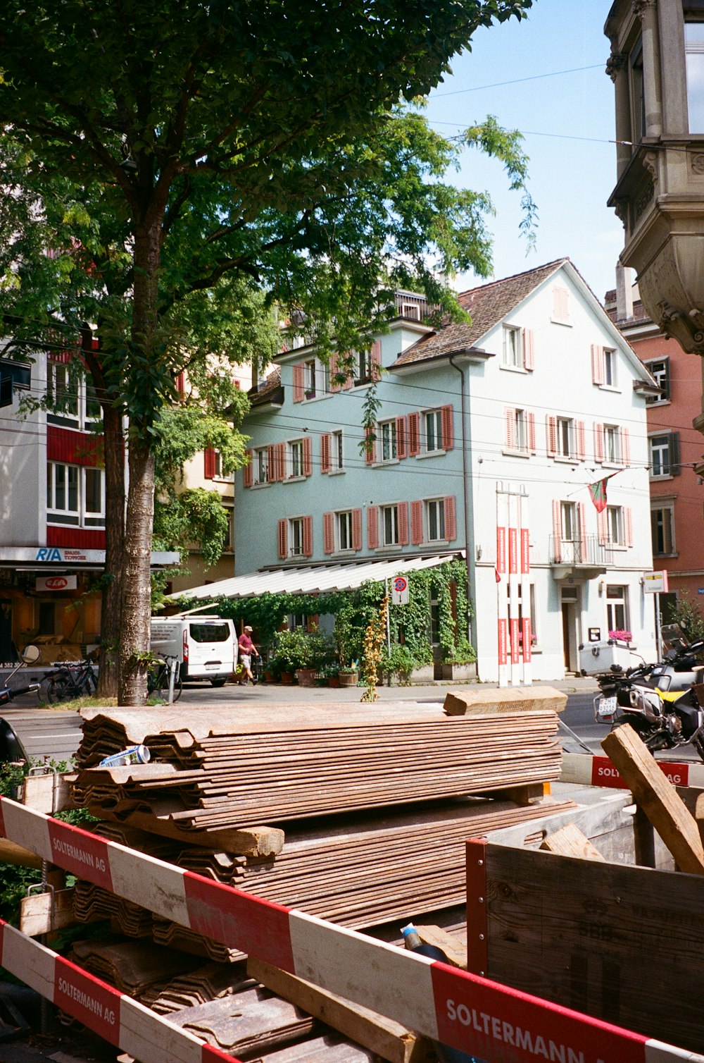 a large wooden deck in front of a building