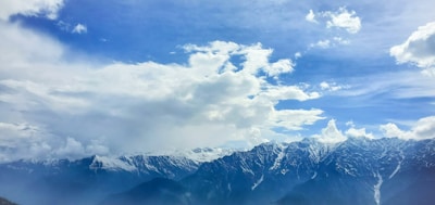 Majestic snow-capped Himalayas viewed from a cozy mountain lodge in Kashmir.