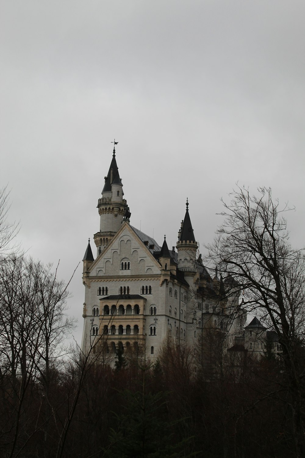 a large castle with a clock on the top of it