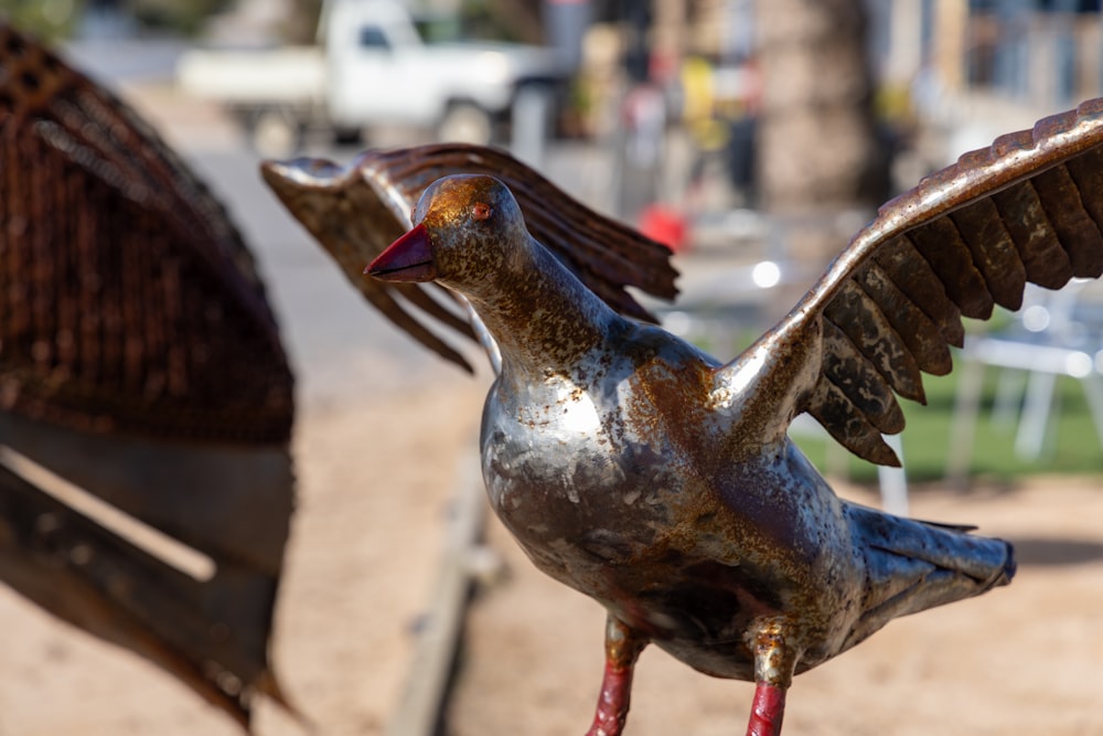 a statue of a bird with its wings spread