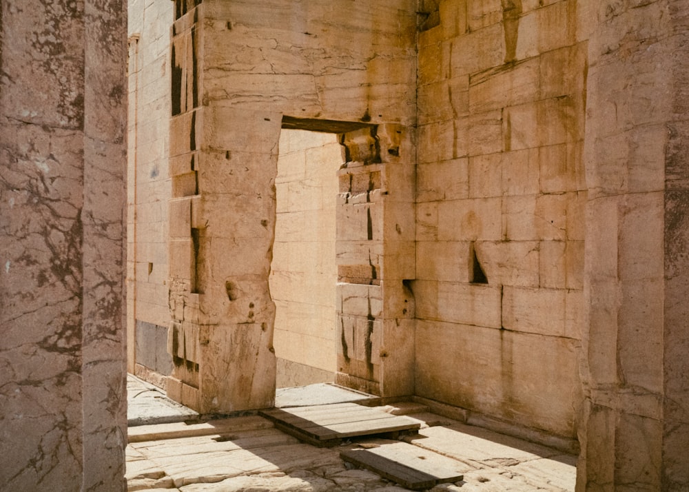 a doorway in a stone building with steps leading to it