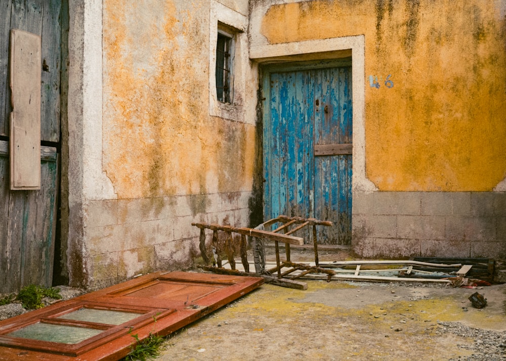 an old run down building with a broken door