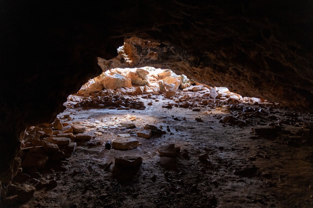 a cave with a light coming from it