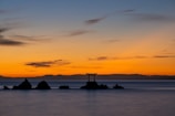 A breathtaking sunset over the Okinawa coastline, symbolizing tranquility.