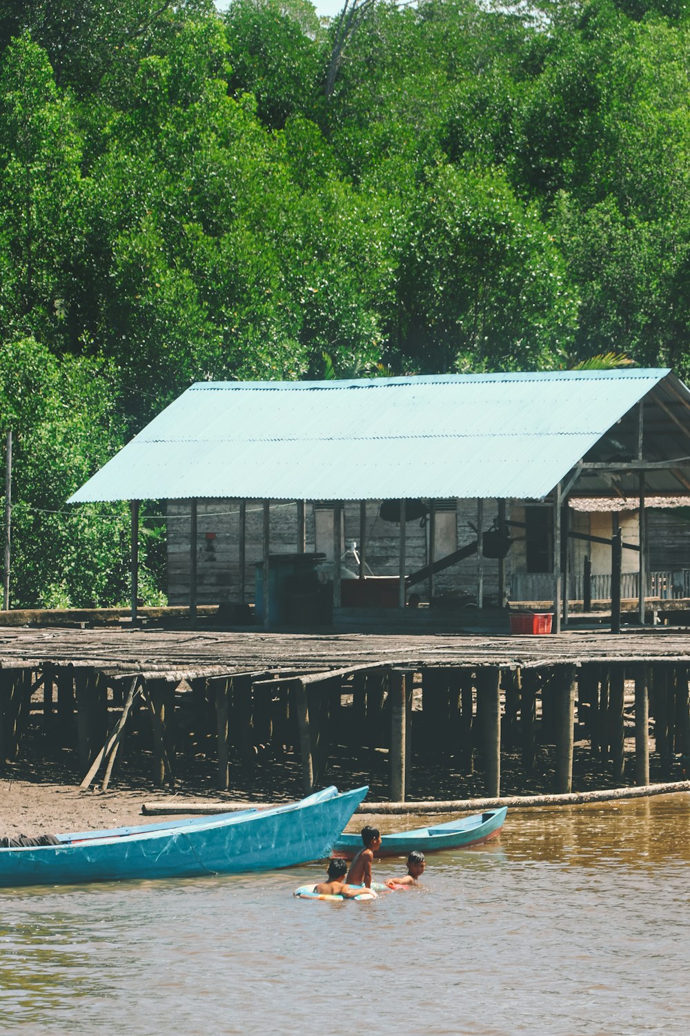 a couple of boats that are sitting in the water