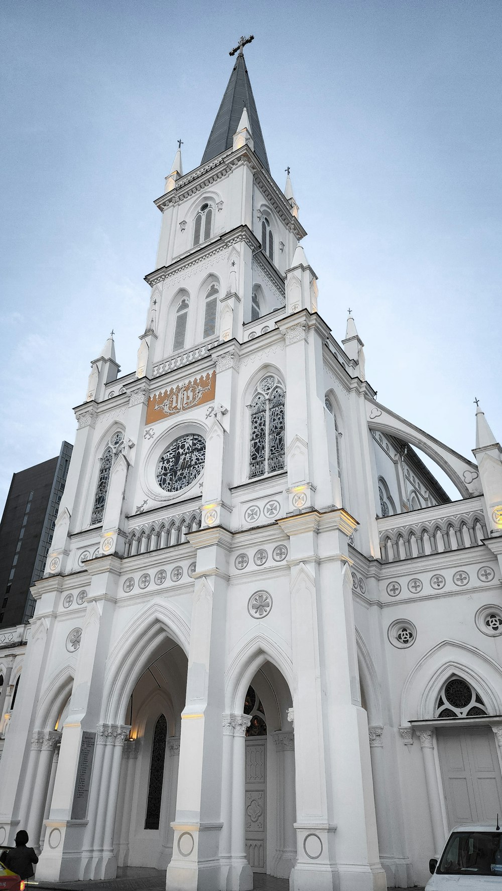 a large white church with a clock tower