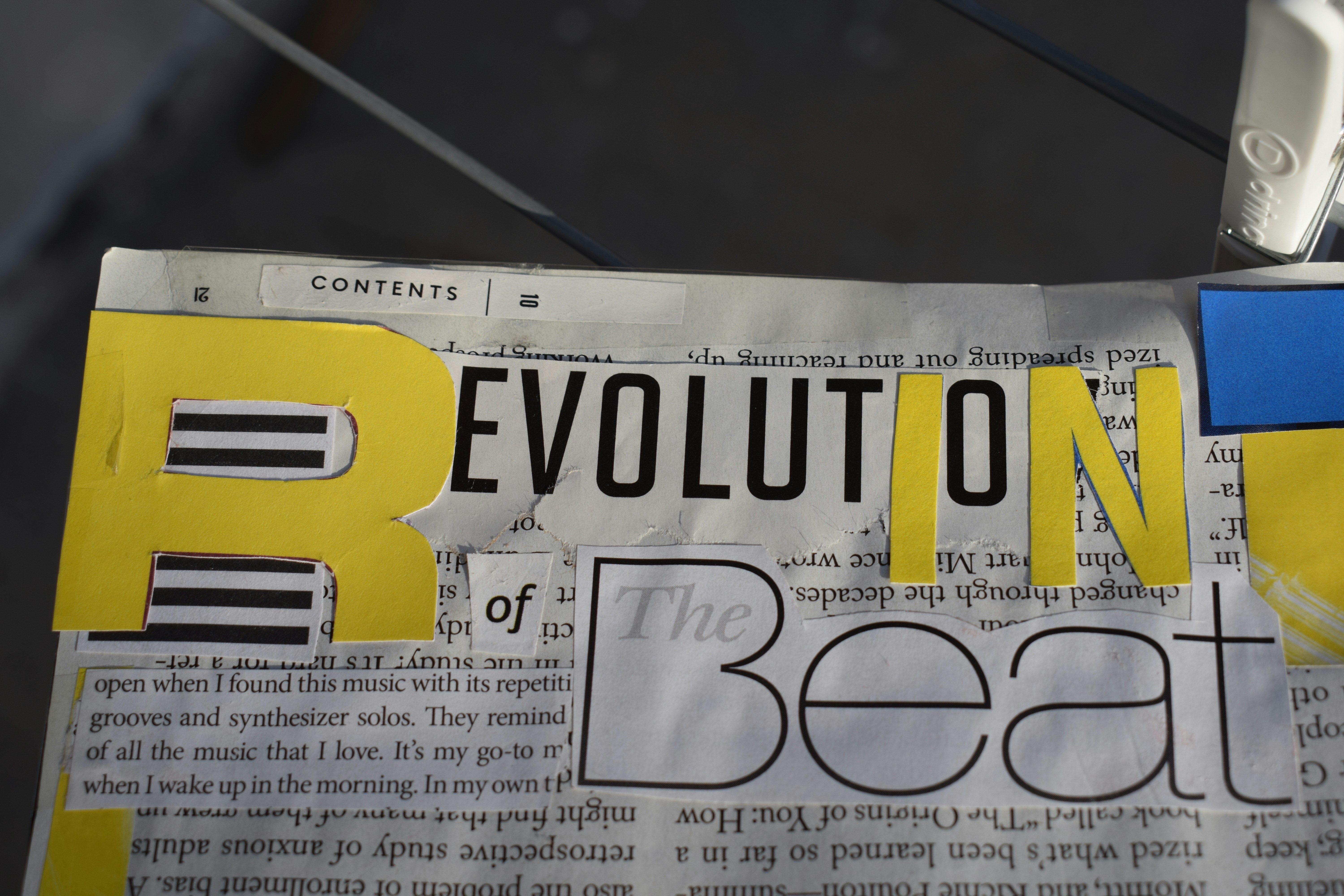 a piece of newspaper with the word evolution on it