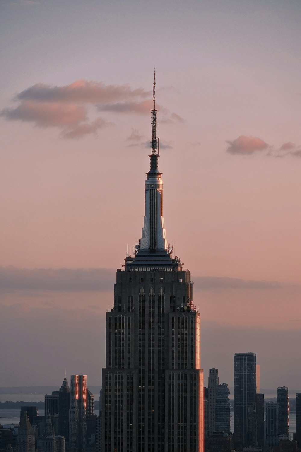 a very tall building with a very tall spire