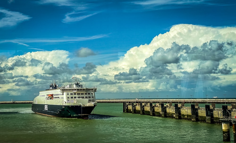 a large boat traveling across a large body of water