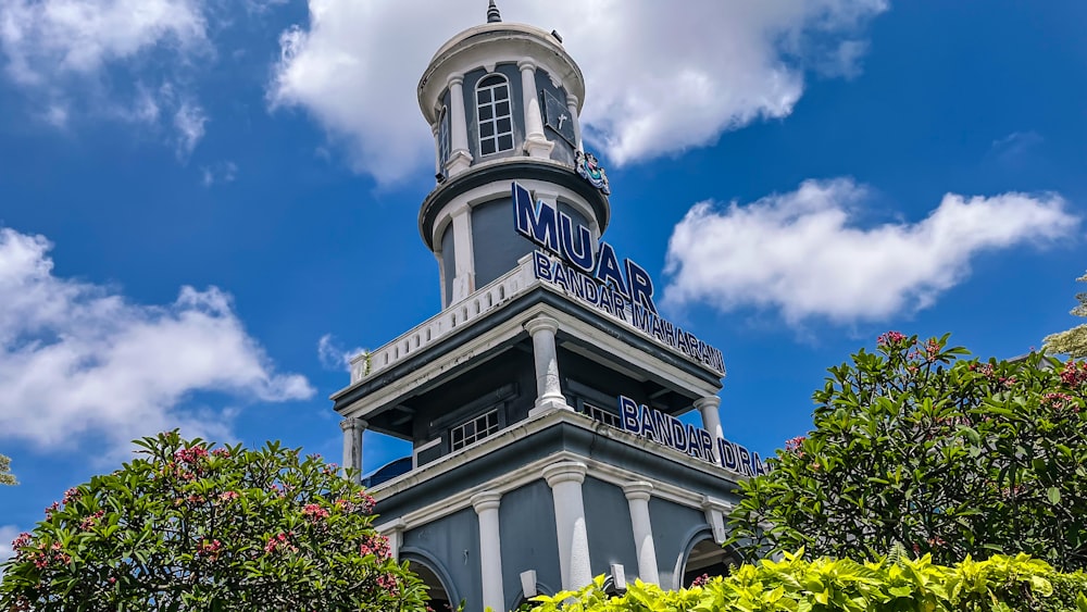 a tall building with a clock on the top of it