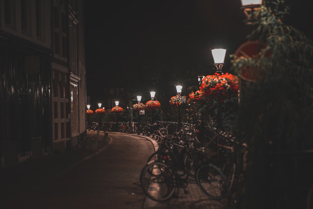 a row of bikes parked next to each other on a street