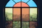a view of a city through a stained glass window
