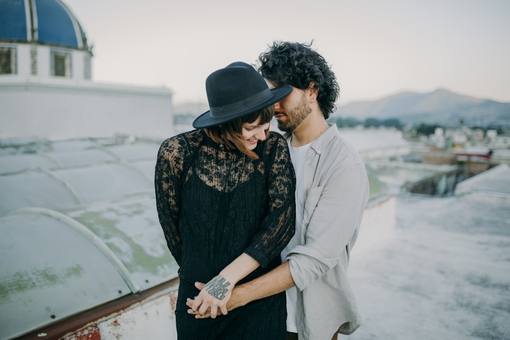 a man and a woman standing next to each other