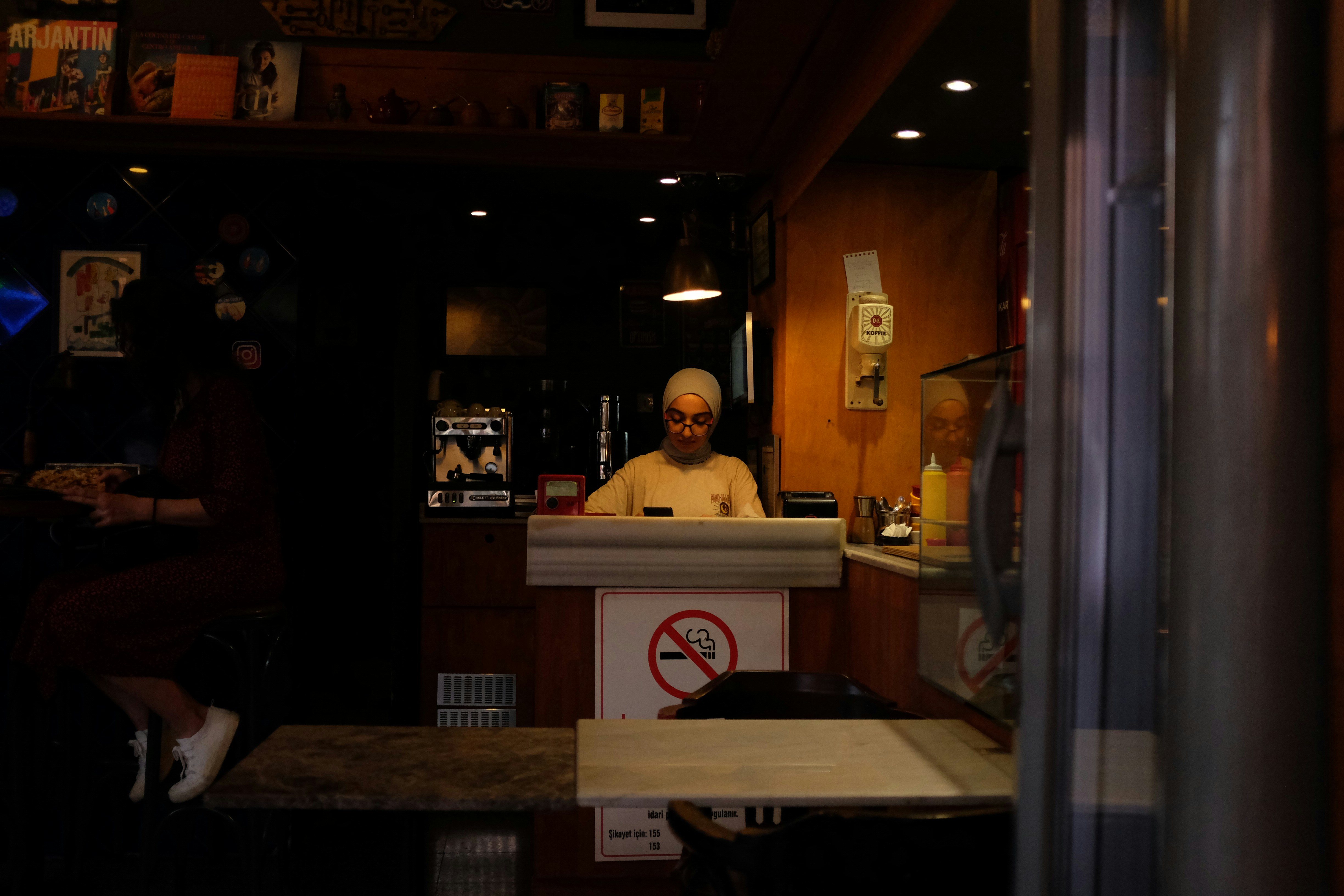 Man sitting at restaurant counter