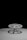 A large industrial valve with a wheel-shaped handle is attached to a flat surface. The valve and handle are prominently featured against a black background, casting distinct shadows on the surface. The simplicity and stark contrast give a dramatic effect to the mechanical object.