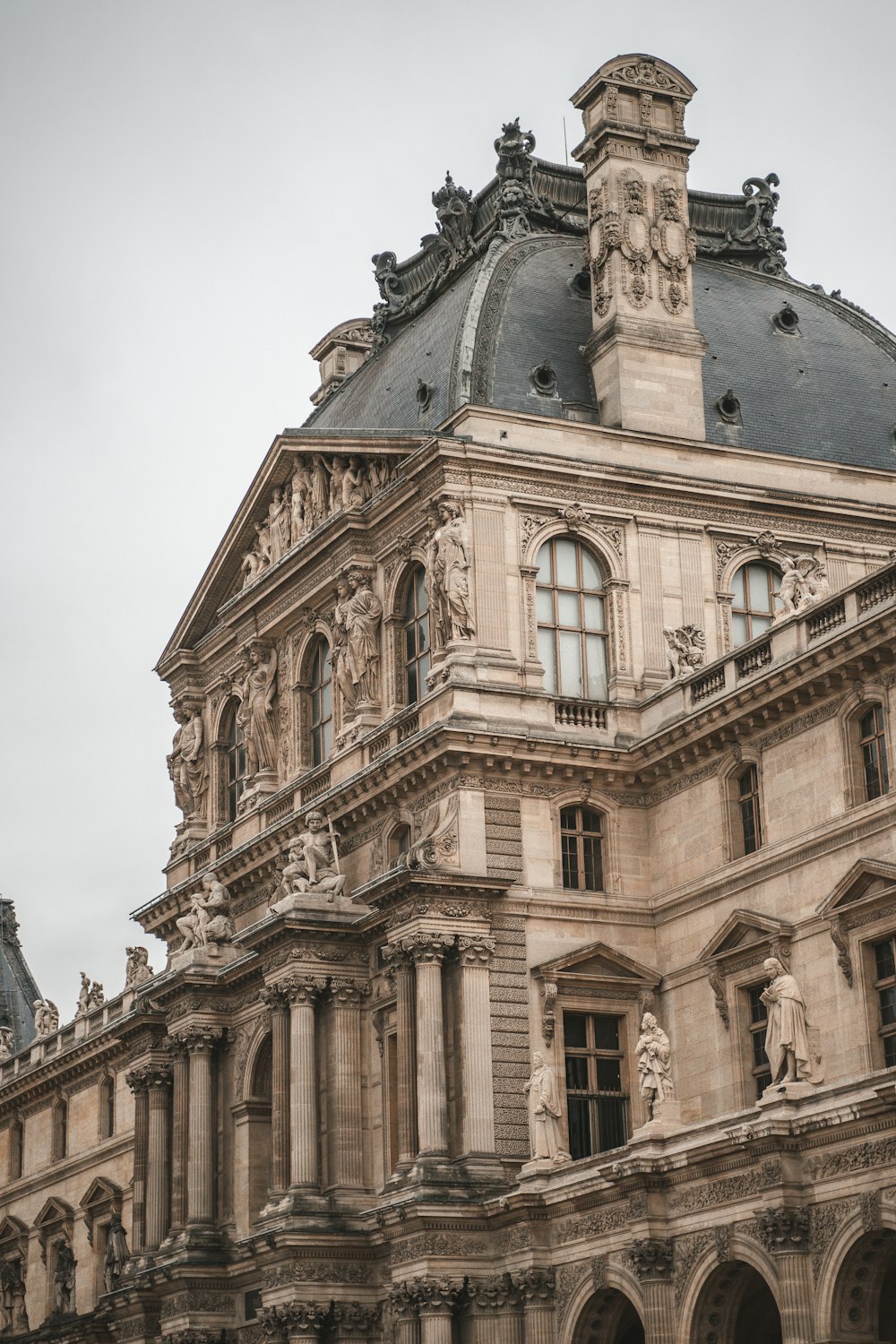 a large building with a clock on the top of it