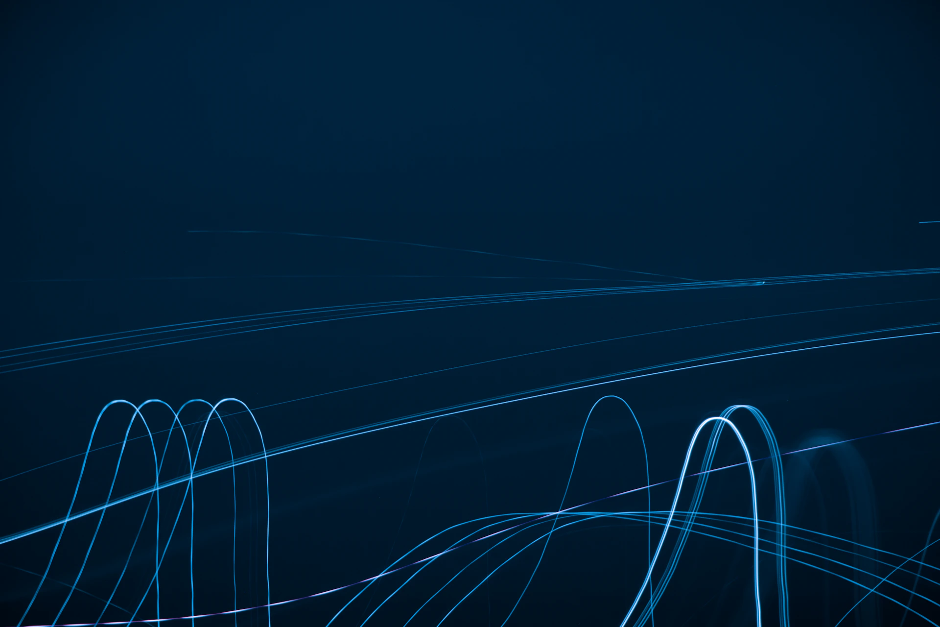 a dark blue background with white lines