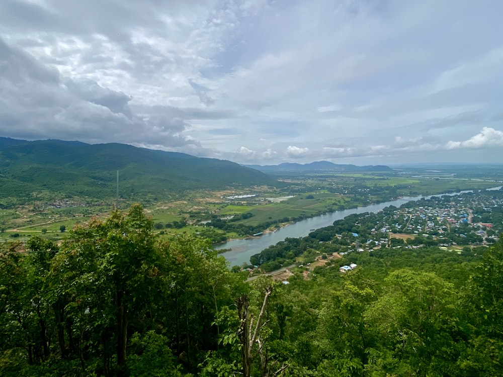 a scenic view of a valley and a river