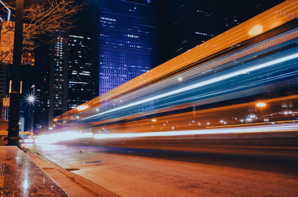 a blurry photo of a city street at night