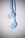 A pair of light blue in-ear headphones with a minimalistic design and the letter 'b' prominently displayed on each earpiece. The headphones are shown against a plain white background, with shadows adding depth.