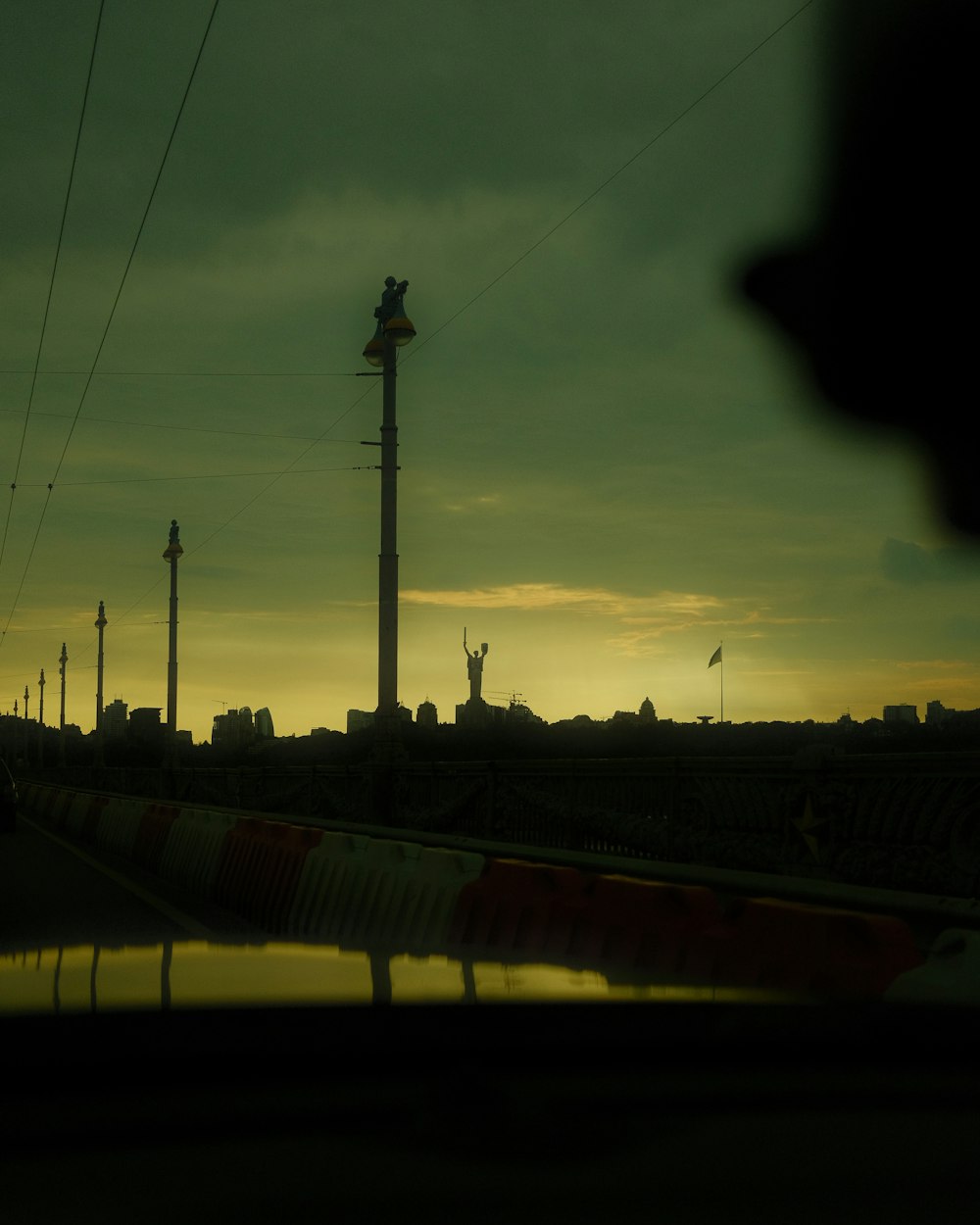 a view of a city from a moving vehicle