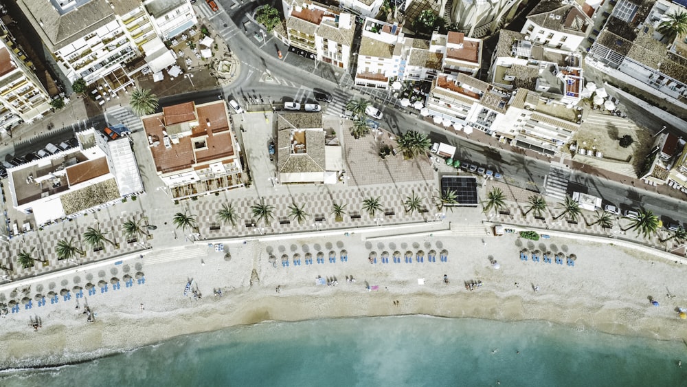 an aerial view of a beach and a city