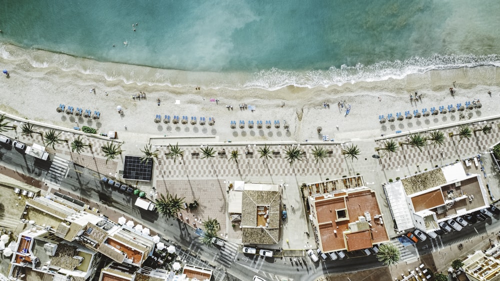 an aerial view of a beach and a city