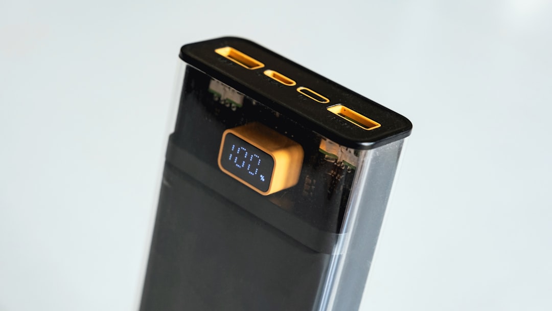 a close up of a cell phone charging, Transparent Portable Charger by Syska