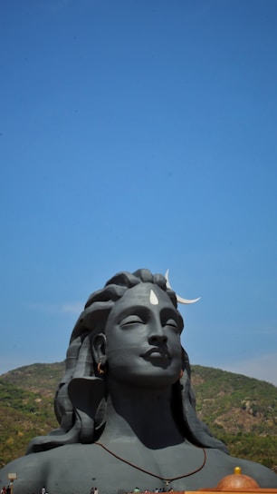 A serene illustration of Lord Shiva meditating under a crescent moon with the Ganges flowing from his hair.