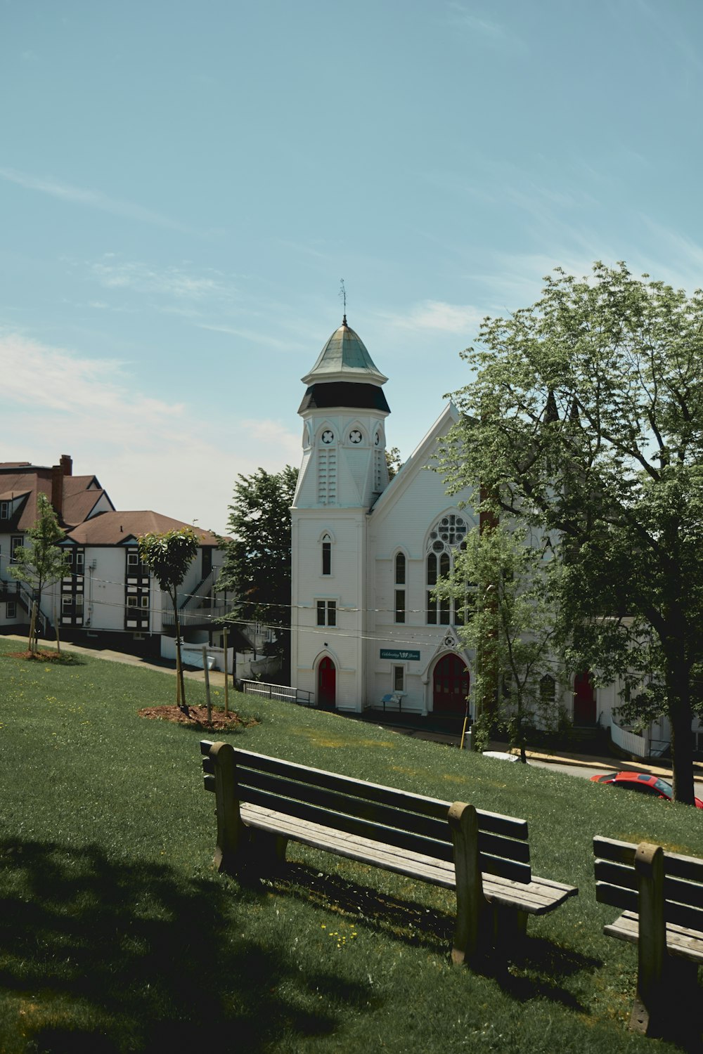 a church with a steeple and a clock tower