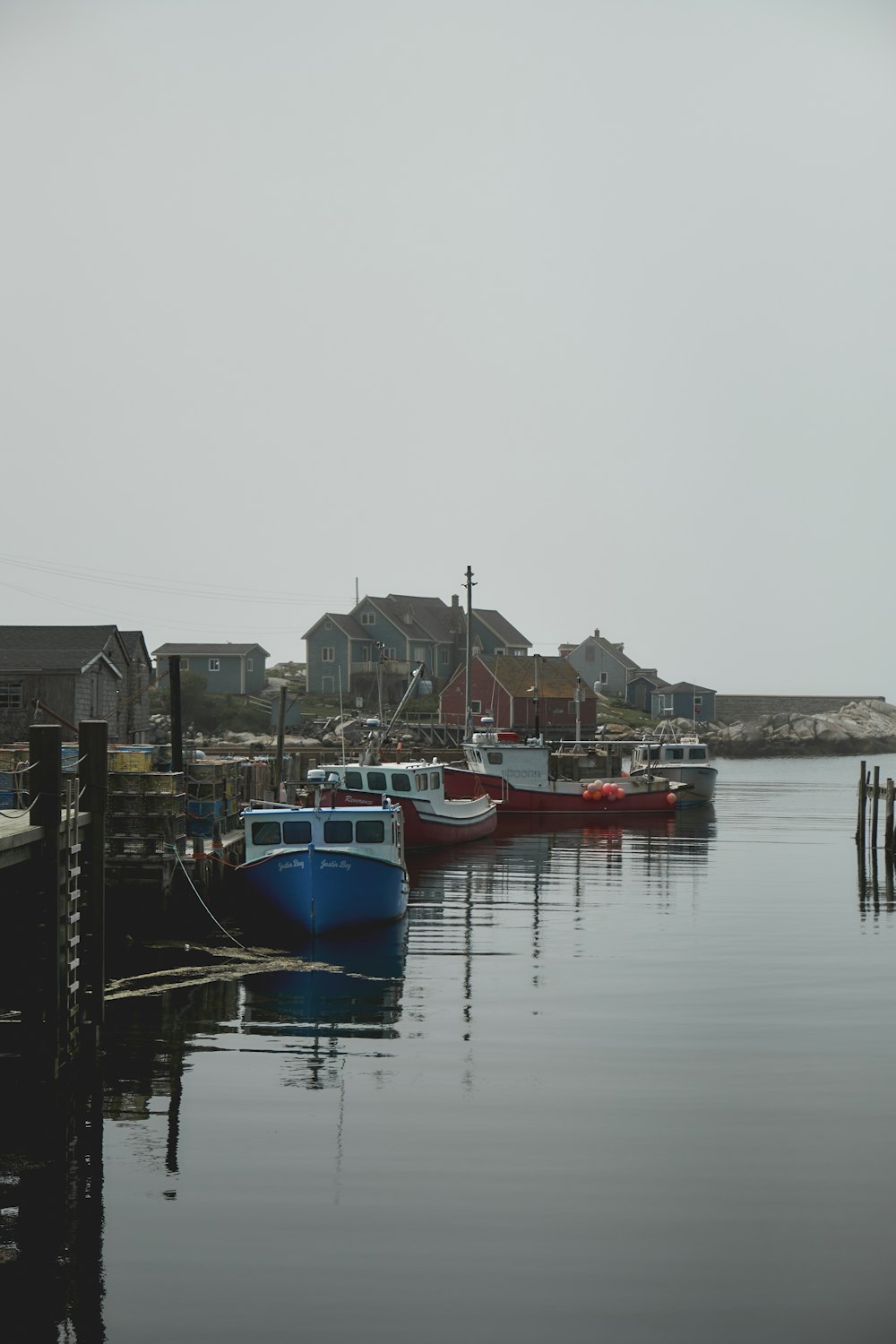 a group of boats that are sitting in the water