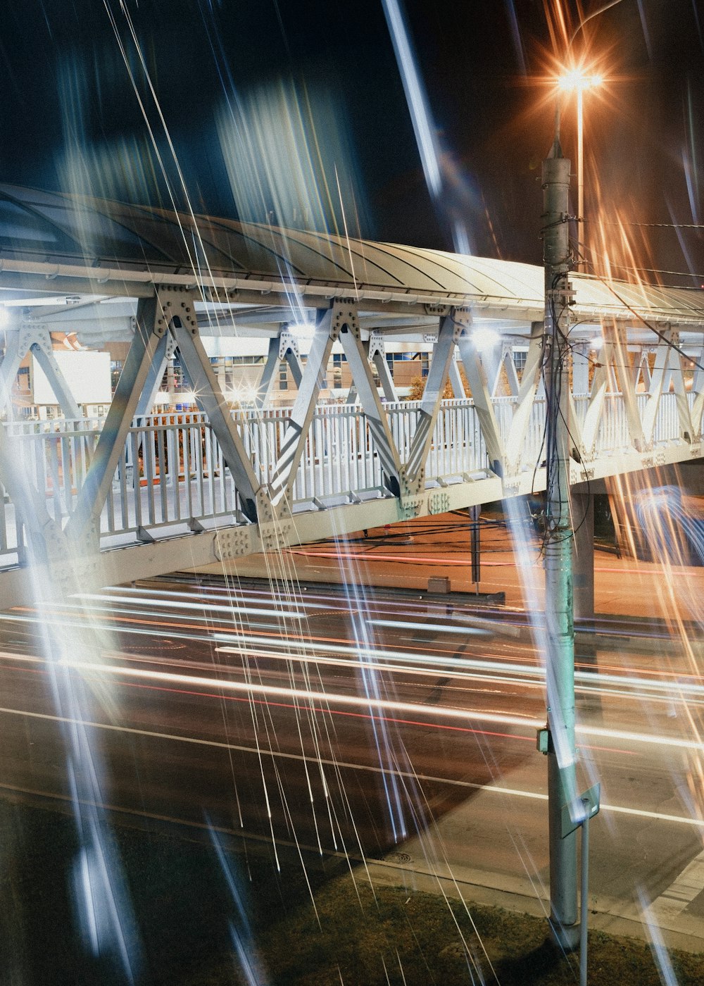 a long exposure of a bridge at night