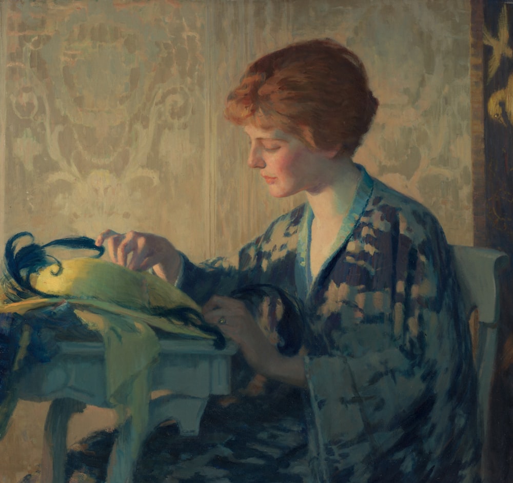 a painting of a woman in a kimono sewing