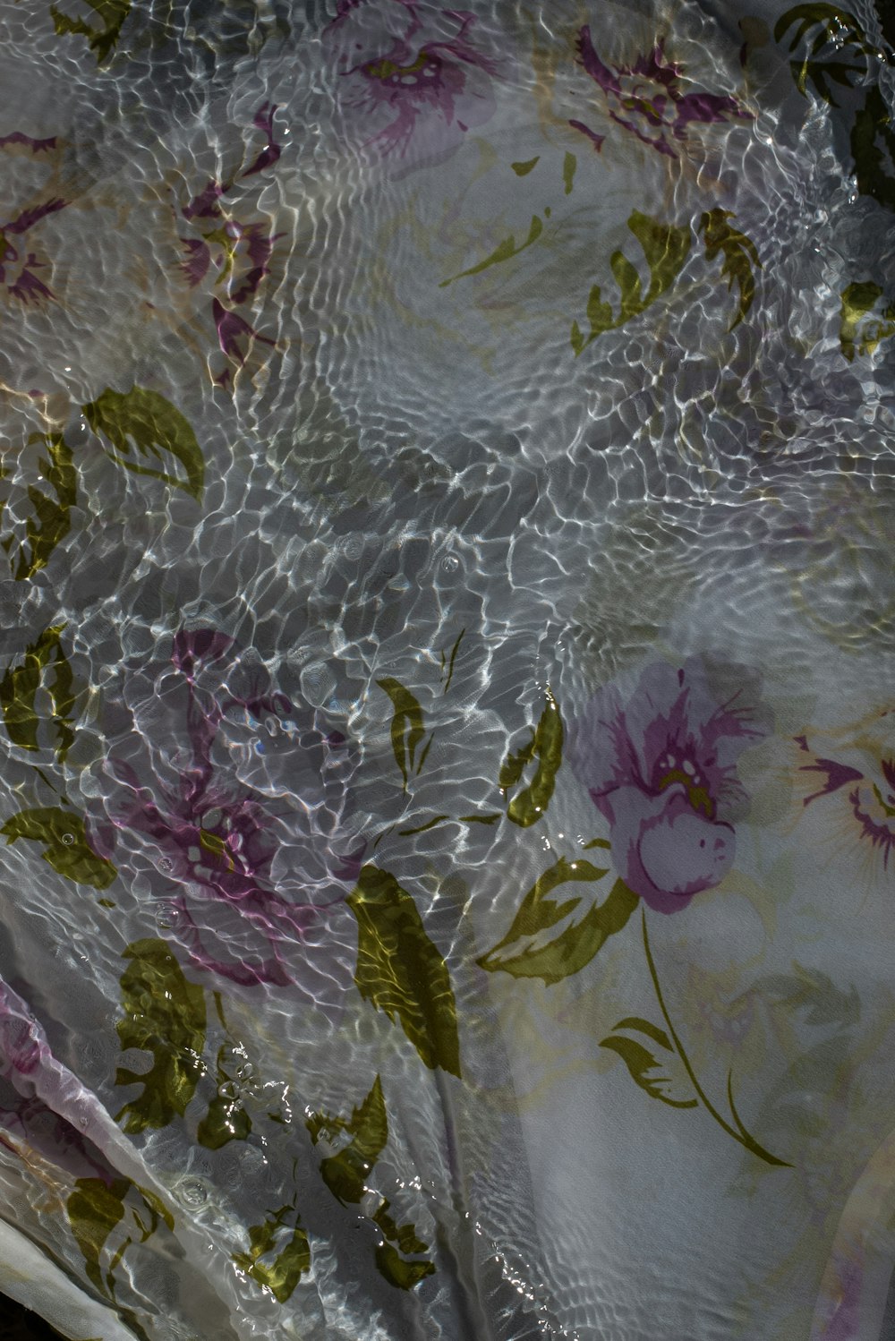 a close up of a fabric with flowers on it