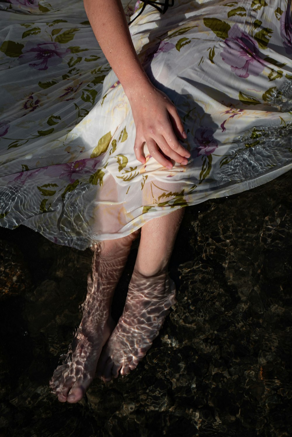 a woman in a white dress and leopard print socks