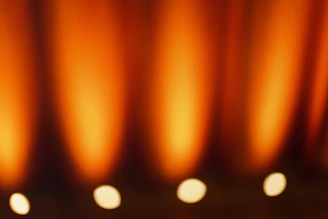 A warm-lit photograph of Alessandra Spagna's vibrant abstract landscape painting.