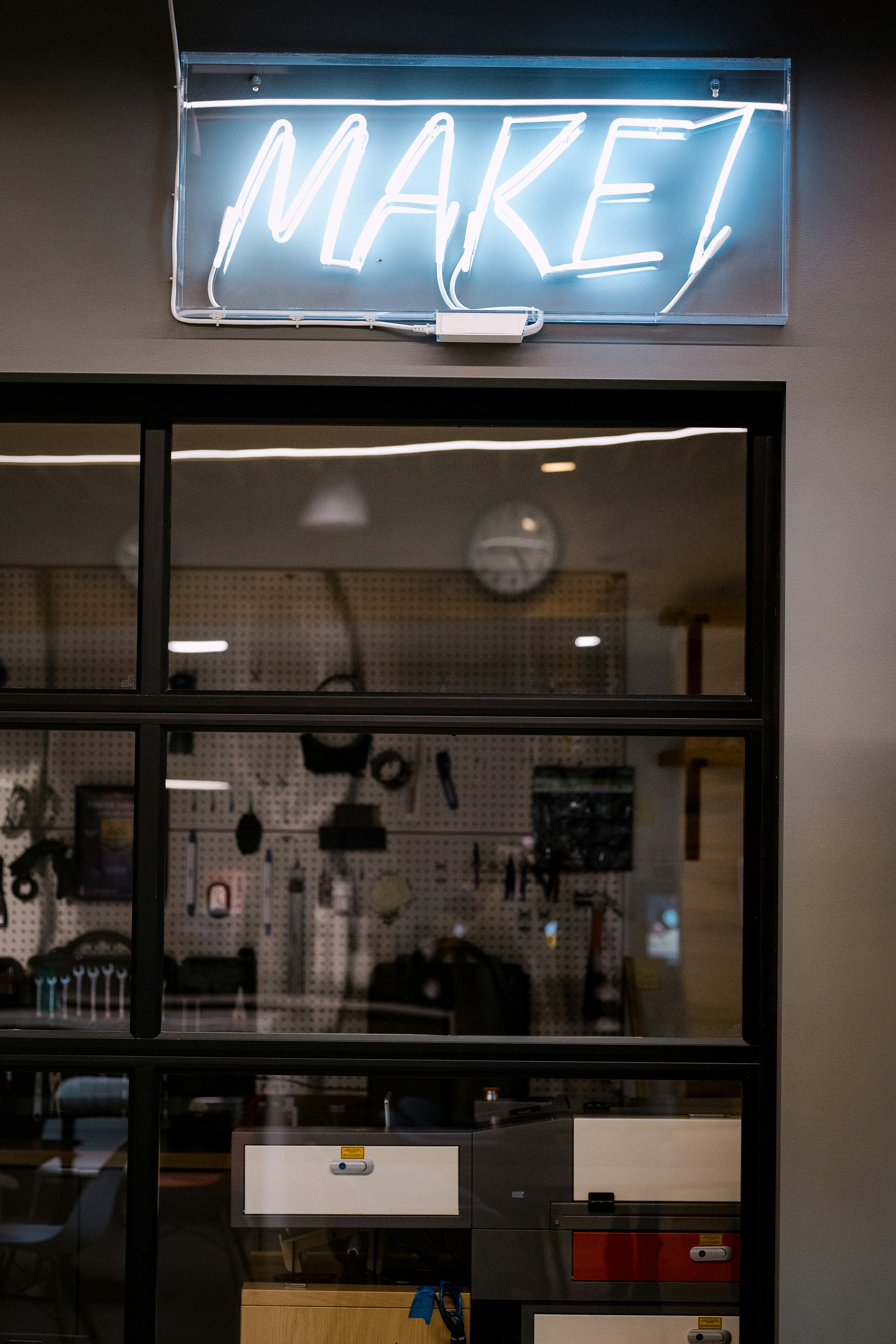 Vibrant store front with neon signage representing bold brand presence