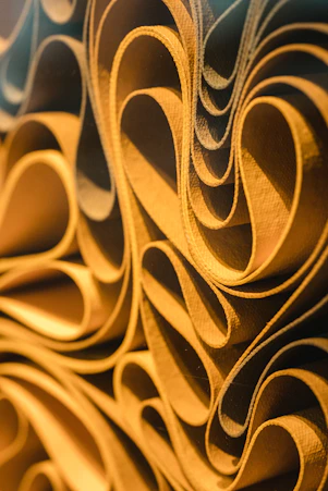 a close up of a wall made of rolled up papers
