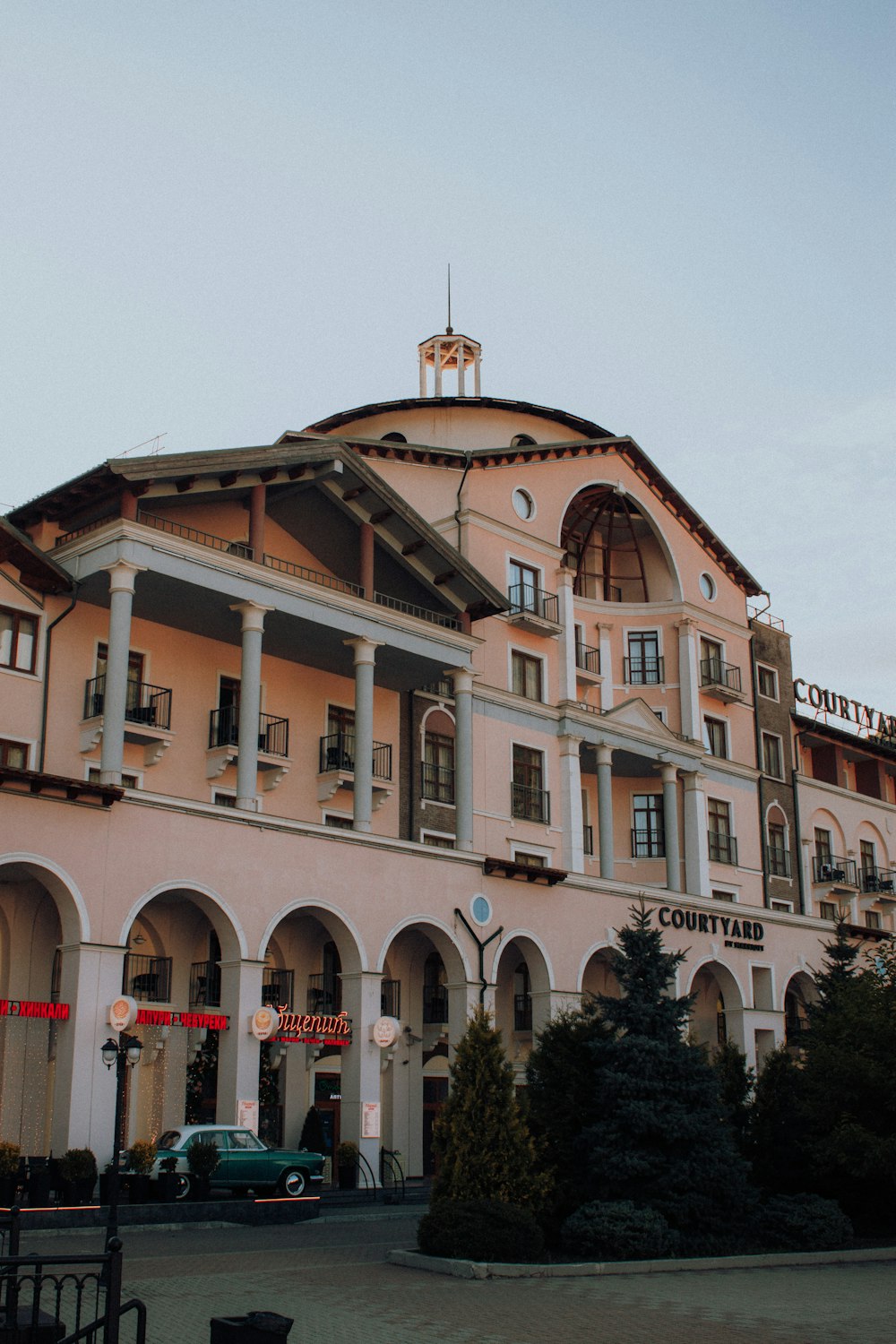 a large building with a clock on the top of it